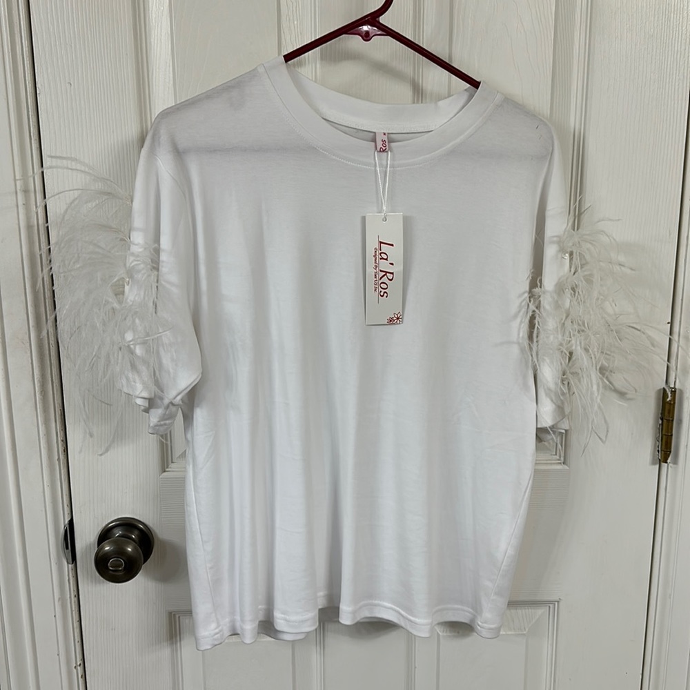 White feather sleeve shirt